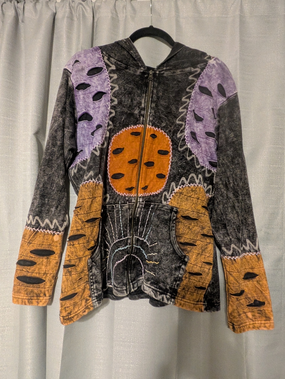 Rising International Black Patchwork Hoodie with Purple and Orange Accents
